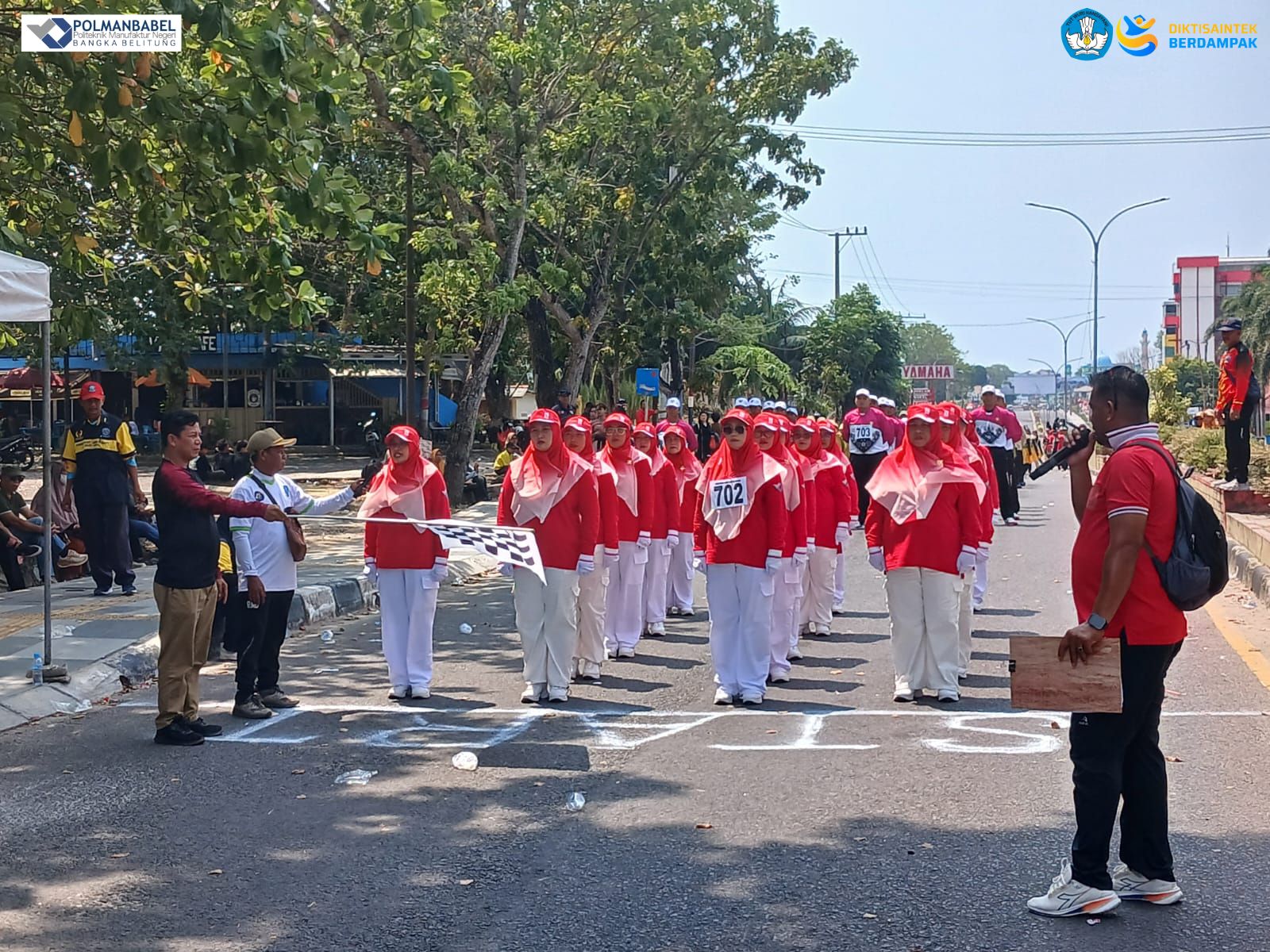 Undeterred by Scorching Weather, Bangka Belitung State Polytechnic Staff Complete 81st Anniversary Marching Parade in Bangka Regency